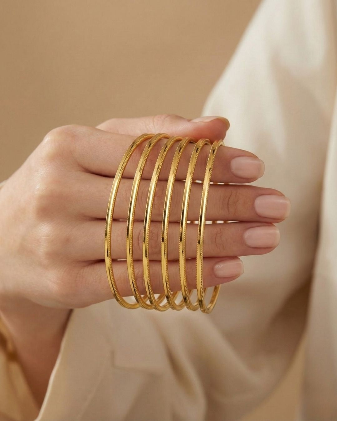 10 Ajda Armreifen 22 karat vergoldet