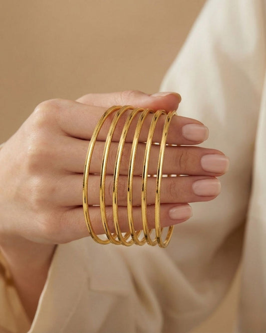 10 Ajda Armreifen 22 karat vergoldet