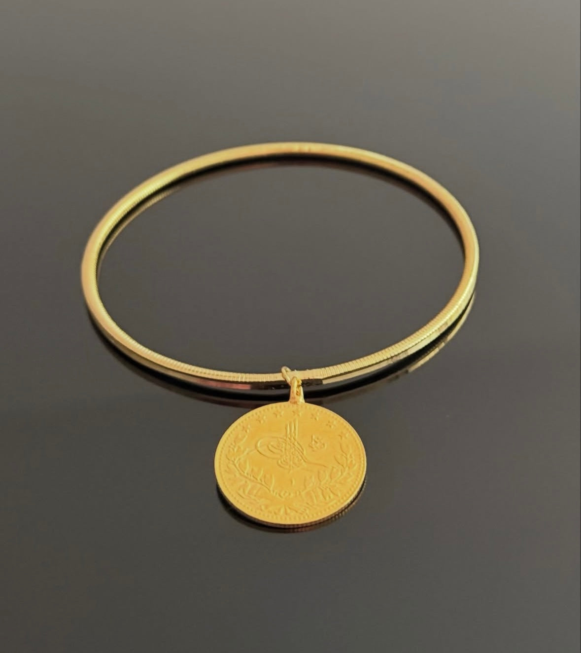 Ajda Armreifen mit Resat 22 k vergoldet